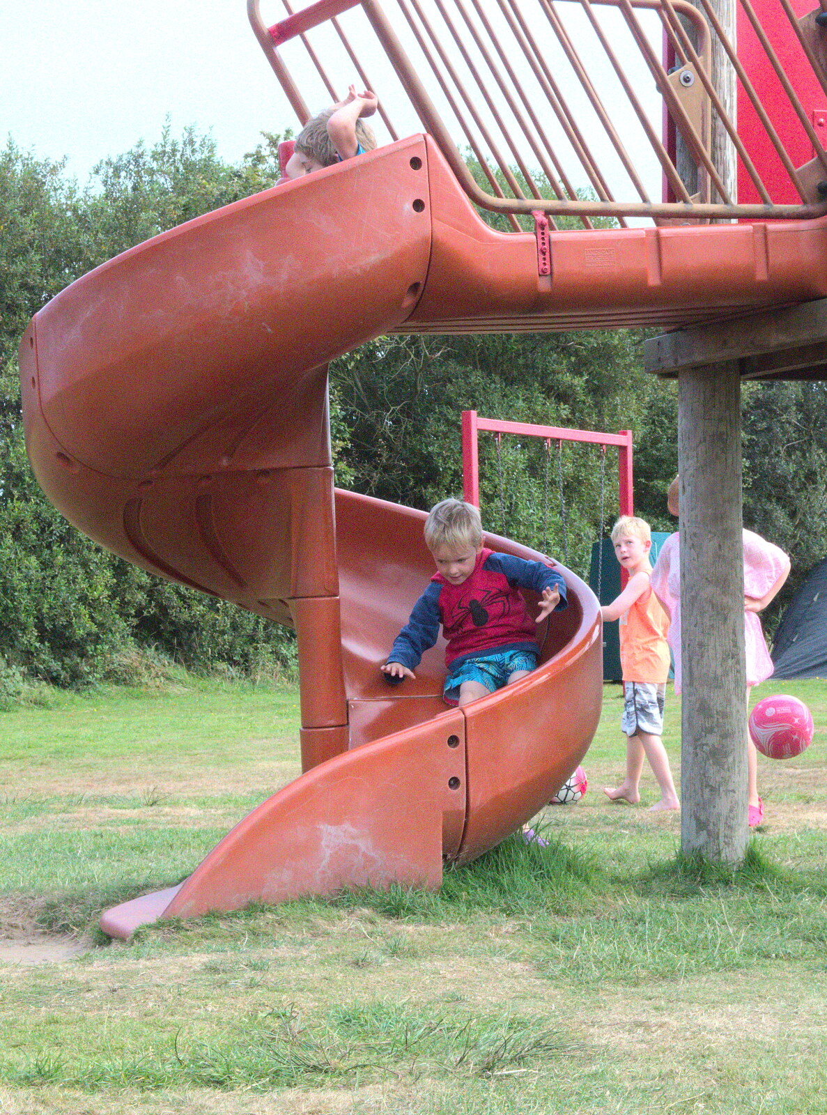 Harry spins down the curly slide from A Trip to Waxham Sands,  Horsey, Norfolk - 27th August 2016