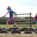 The boys run around the tyre ring, A Trip to Waxham Sands,  Horsey, Norfolk - 27th August 2016