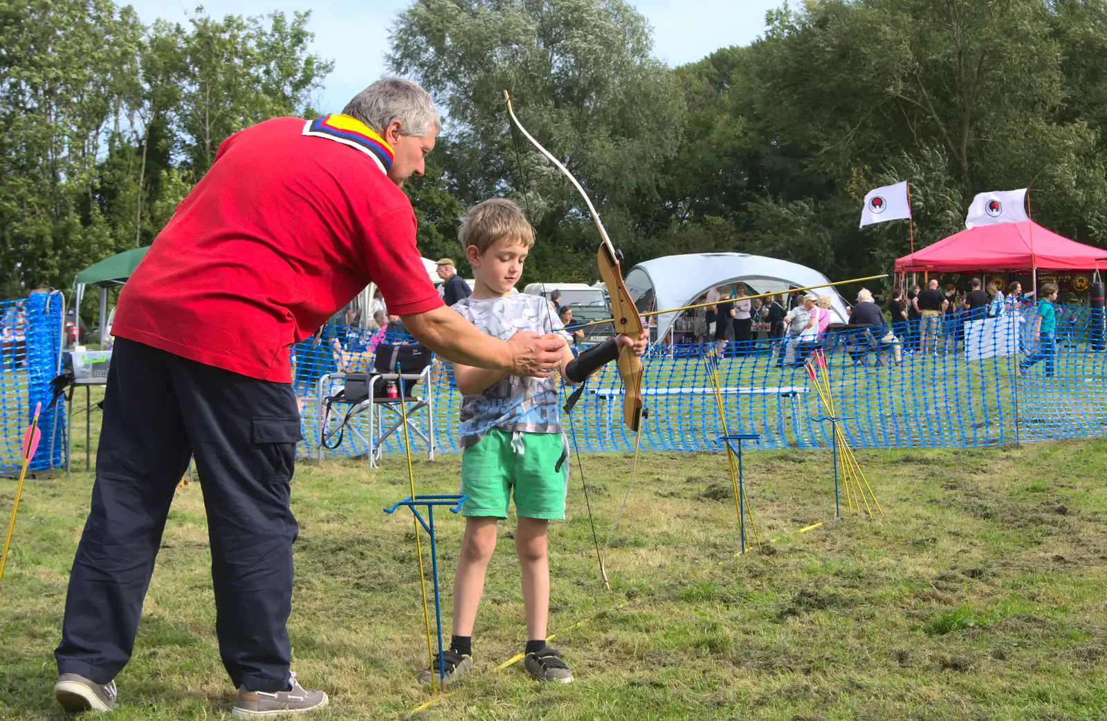 Fred gets a lesson in archery, from The Eye Scouts Duck Race, The Pennings, Eye, Suffolk - 24th September 2016