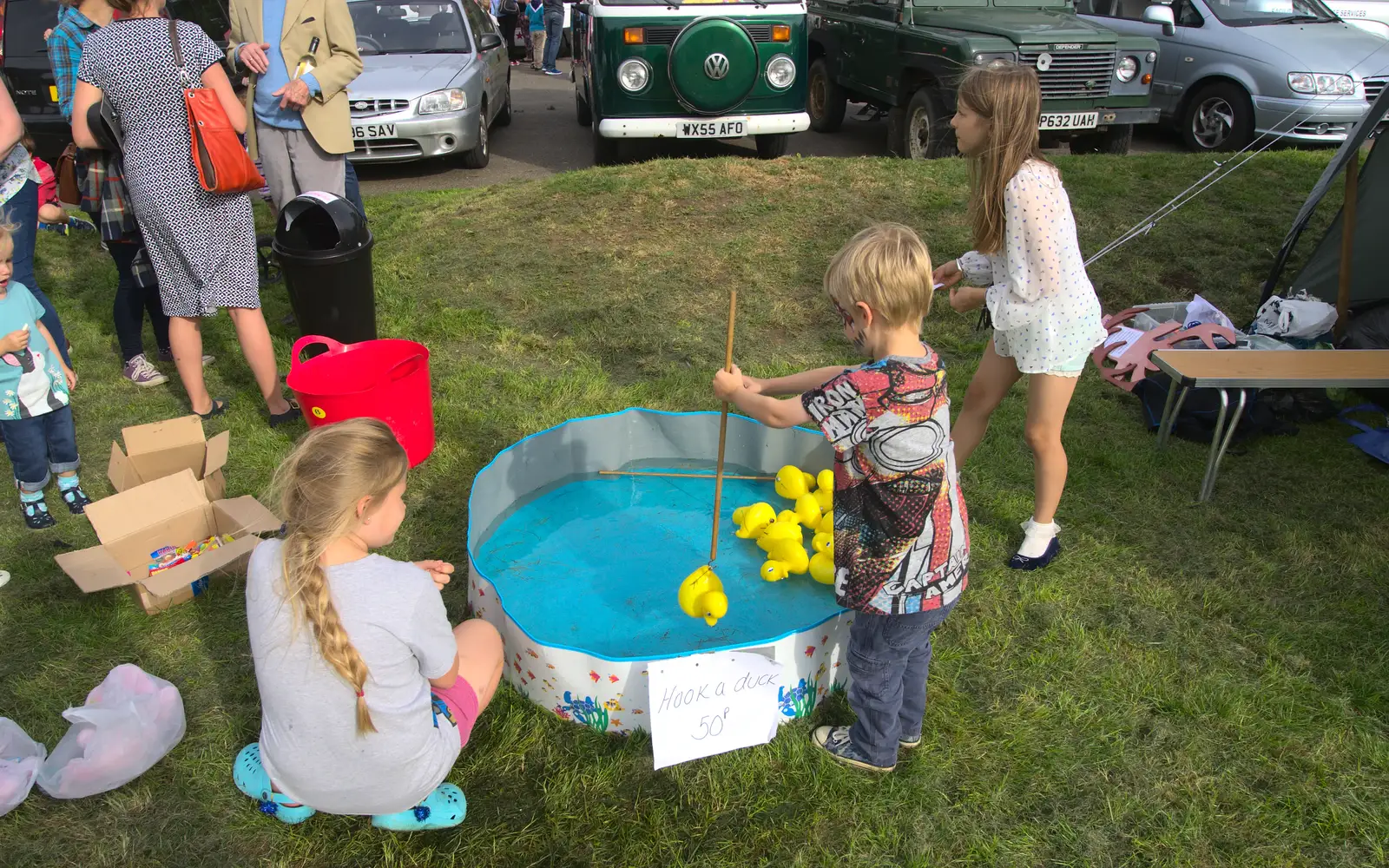 Harry fishes for yet more ducks, from The Eye Scouts Duck Race, The Pennings, Eye, Suffolk - 24th September 2016