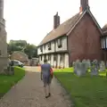 Isobel wanders back past the church, The Eye Scouts Duck Race, The Pennings, Eye, Suffolk - 24th September 2016