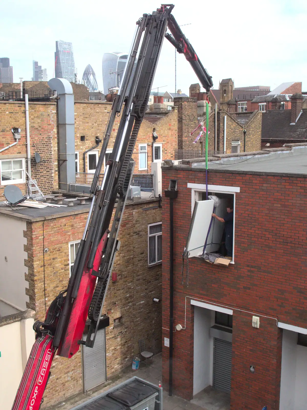 Something large is craned in through a window, from An October Miscellany, Suffolk - 8th October 2016