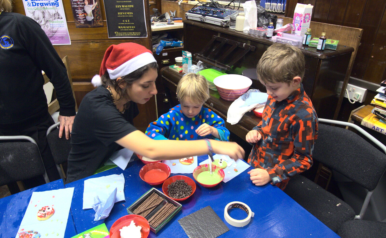 Fred and Harry decorate biscuits in The Bank from The Eye Christmas Lights, Eye, Suffolk - 2nd December 2016