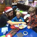 Fred and Harry decorate biscuits in The Bank, The Eye Christmas Lights, Eye, Suffolk - 2nd December 2016