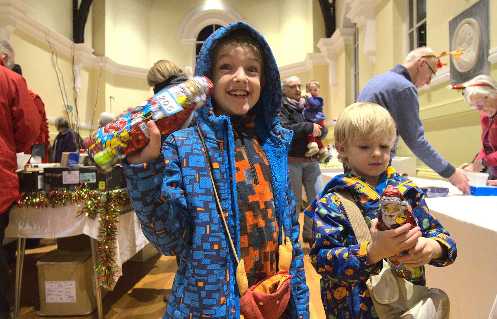 Fred and Harry score some free chocolate from The Eye Christmas Lights, Eye, Suffolk - 2nd December 2016