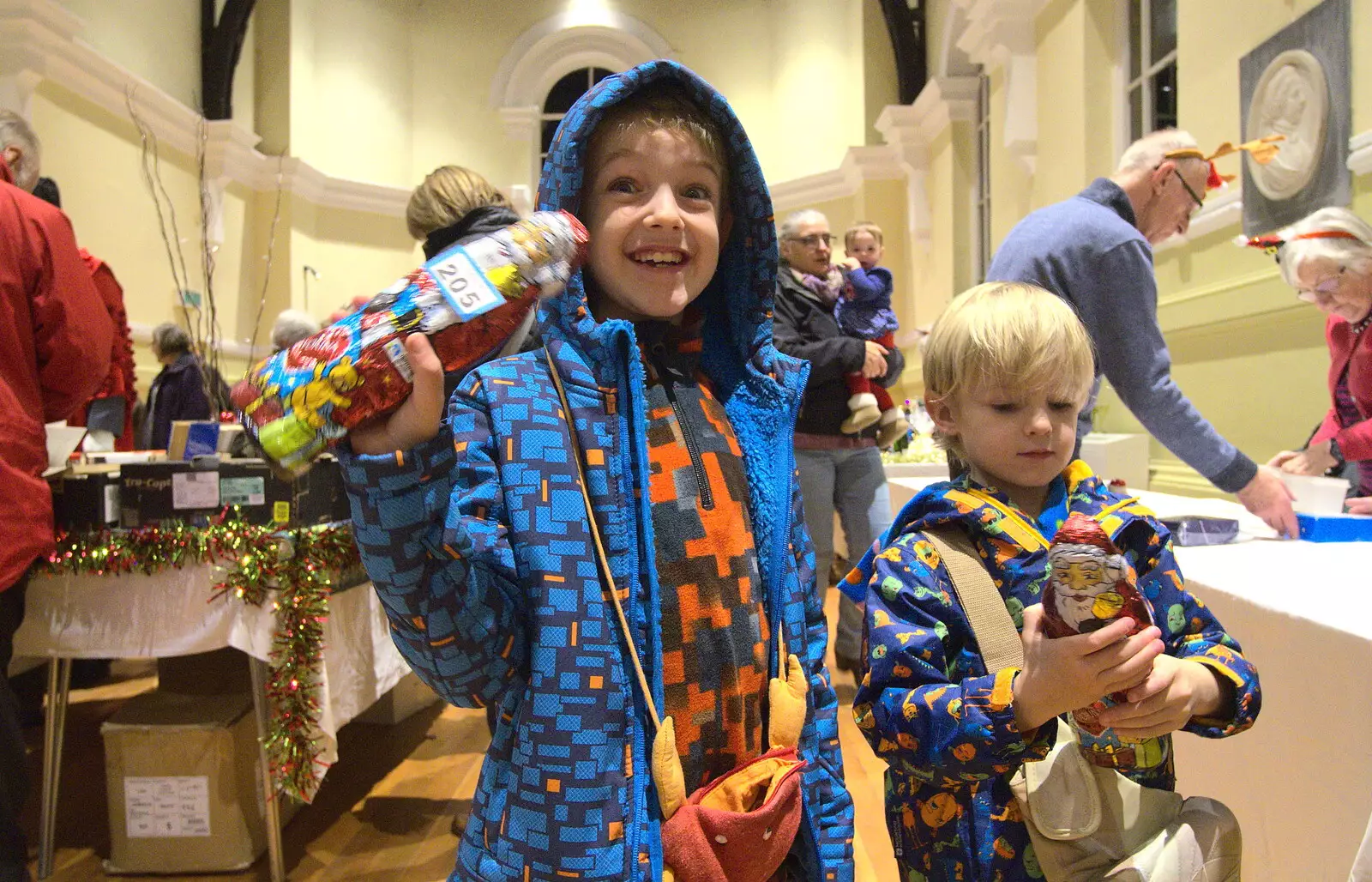 Fred and Harry score some free chocolate, from The Eye Christmas Lights, Eye, Suffolk - 2nd December 2016