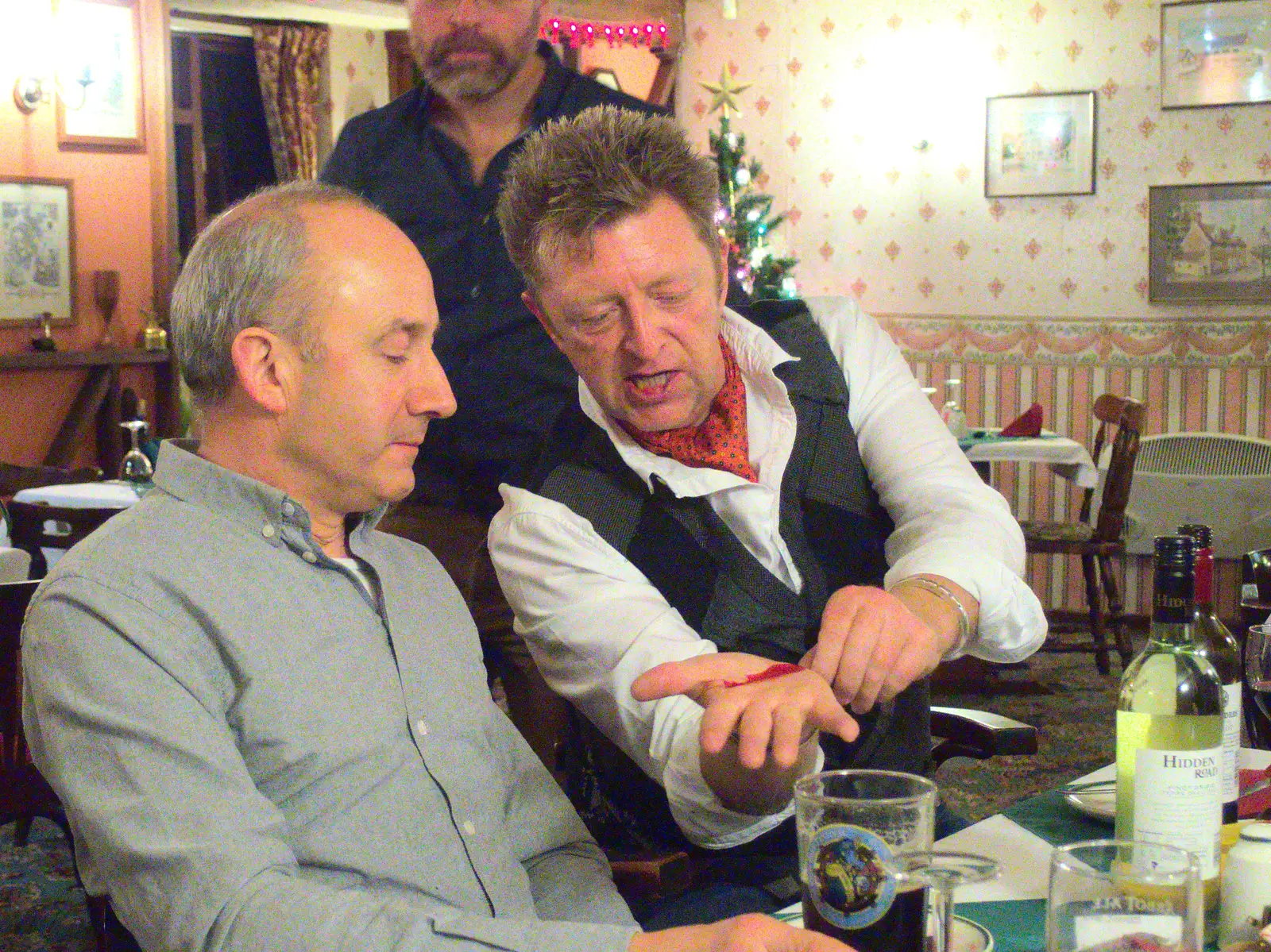 Gaz does the fish love test, from The BSCC Christmas Dinner at The Swan Inn, Brome, Suffolk - 3rd December 2016