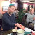 Marc does the cellophane fish thing, The BSCC Christmas Dinner at The Swan Inn, Brome, Suffolk - 3rd December 2016