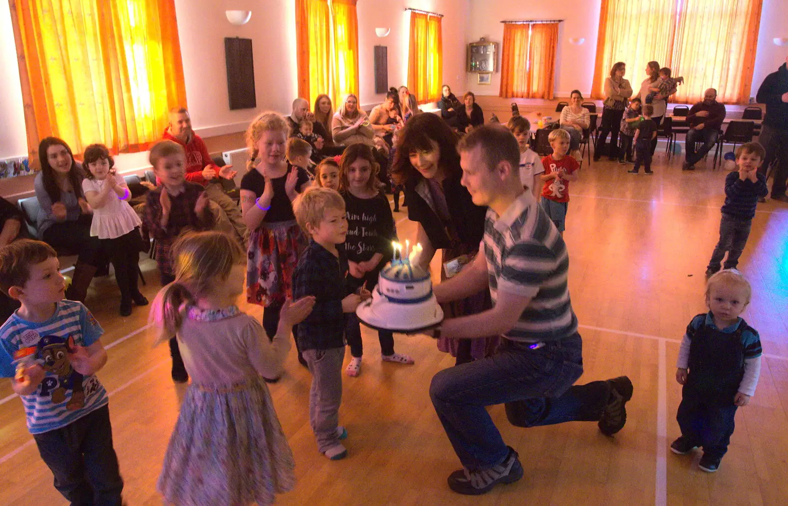 Everyone stops to watch the cake arriving, from Jack's Birthday and New Windows, Brome and Brockdish, Norfolk - 4th December 2016