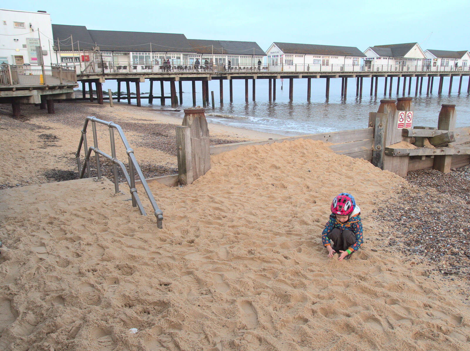 Harry pokes around in the sand from Southwold Seaside Pier, Southwold, Suffolk - 18th December 2016