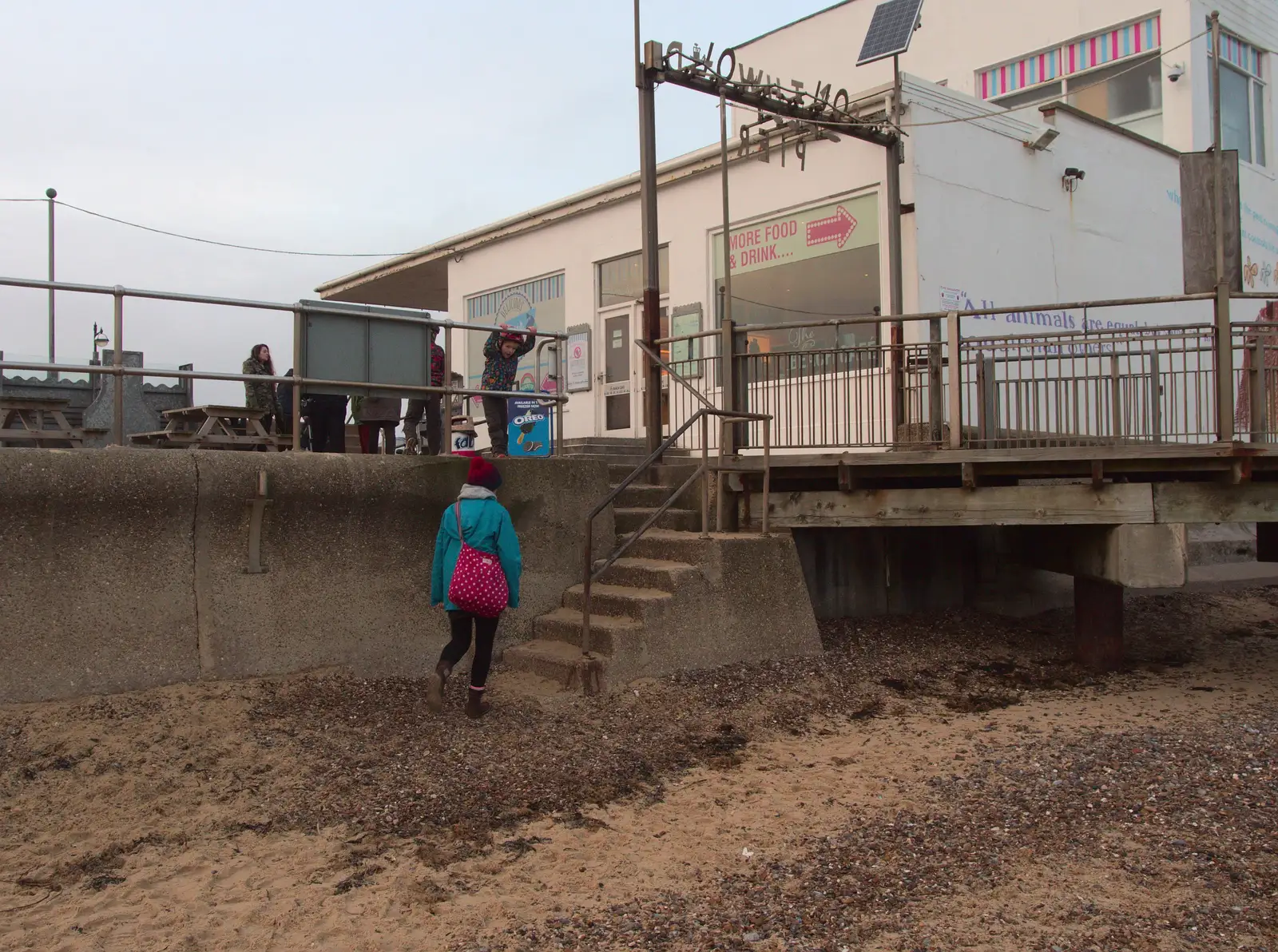 Isobel heads up the beach steps, from Southwold Seaside Pier, Southwold, Suffolk - 18th December 2016