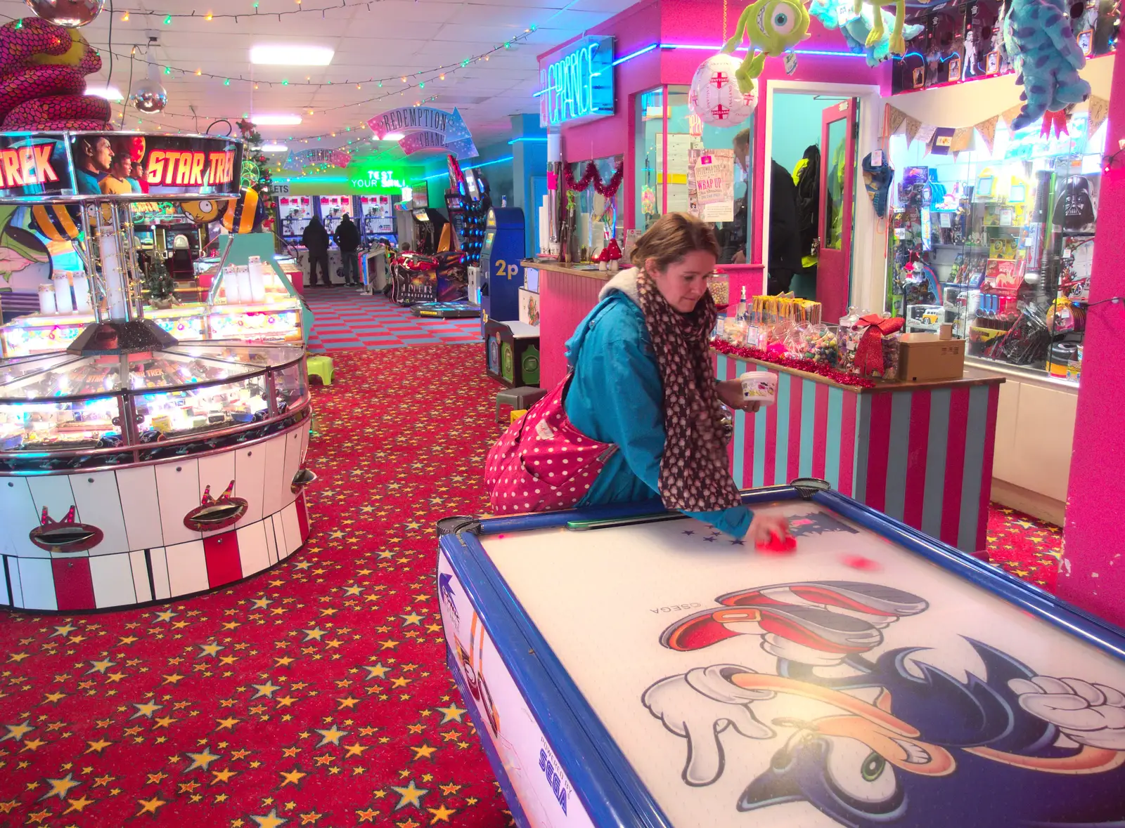 Isobel does one-handed Air Hockey, from Southwold Seaside Pier, Southwold, Suffolk - 18th December 2016