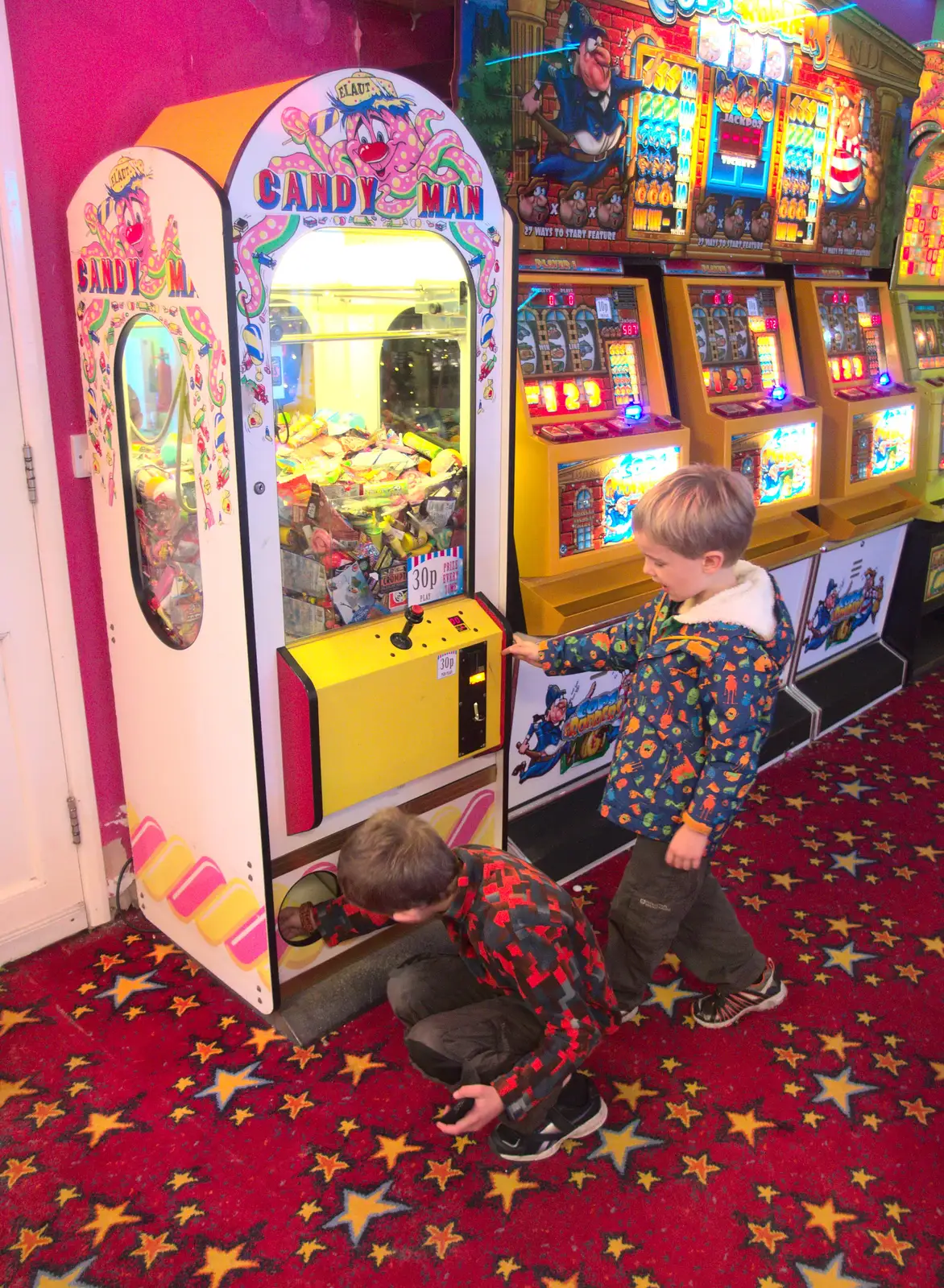 The boys at the sweets machine, from Southwold Seaside Pier, Southwold, Suffolk - 18th December 2016