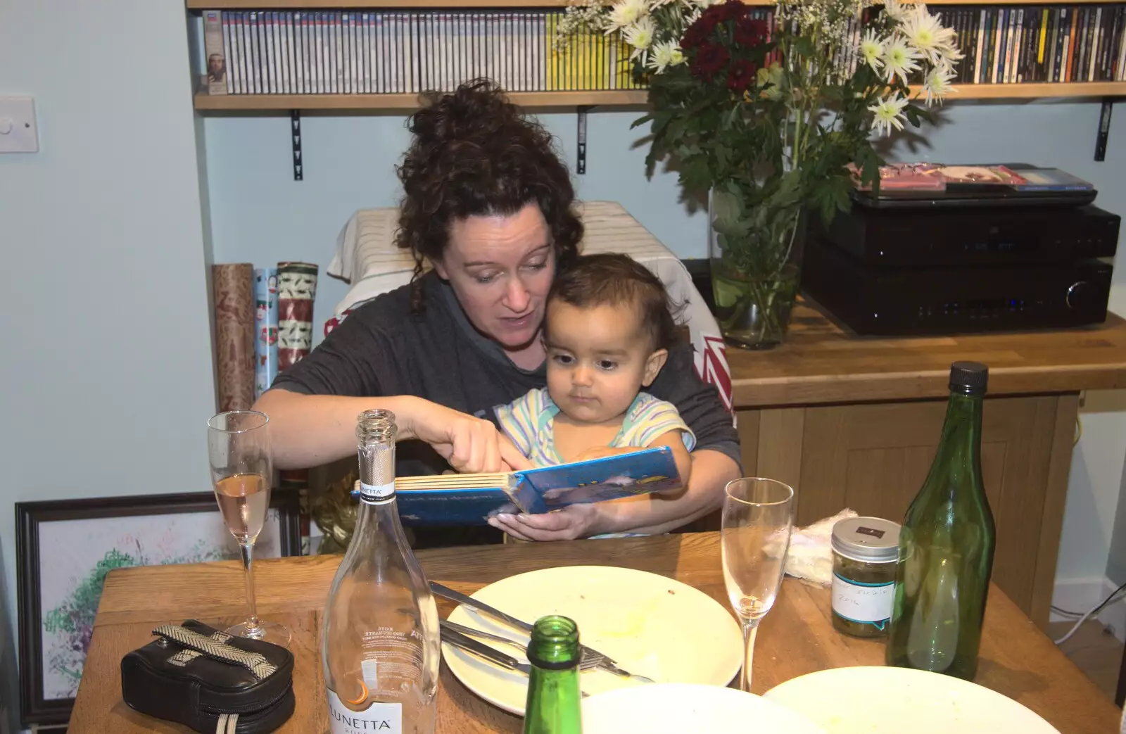 Evelyn reads to Nico, from Christmas and All That, Brome, Suffolk - 25th December 2016