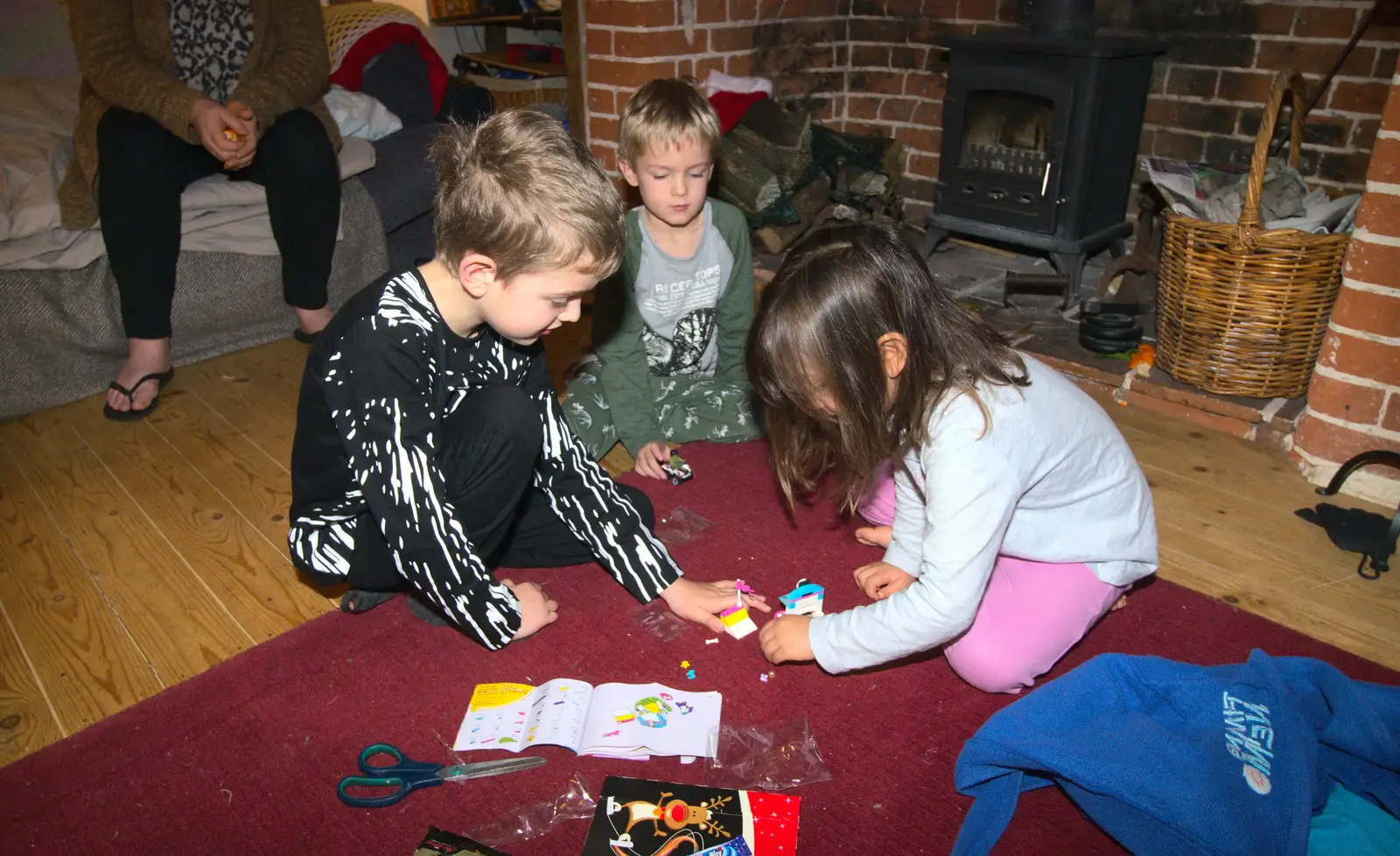 Some early Christmas-present opening occurs, from Christmas and All That, Brome, Suffolk - 25th December 2016