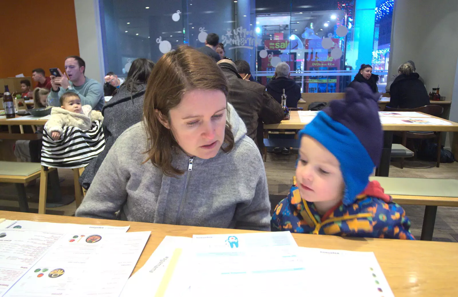 Isobel and Harry scope the menu, from A Trip to Ickworth House, Horringer, Suffolk - 30th December 2016