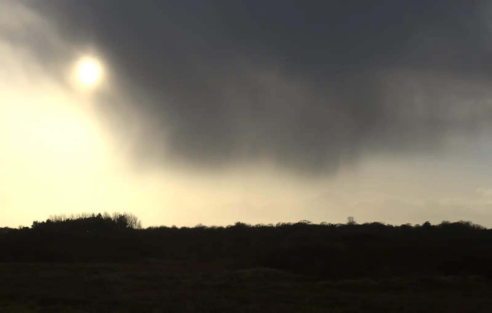 A belt of rain sweeps over the sun, from Horsey Seals and Sea Palling, Norfolk Coast - 2nd January 2017