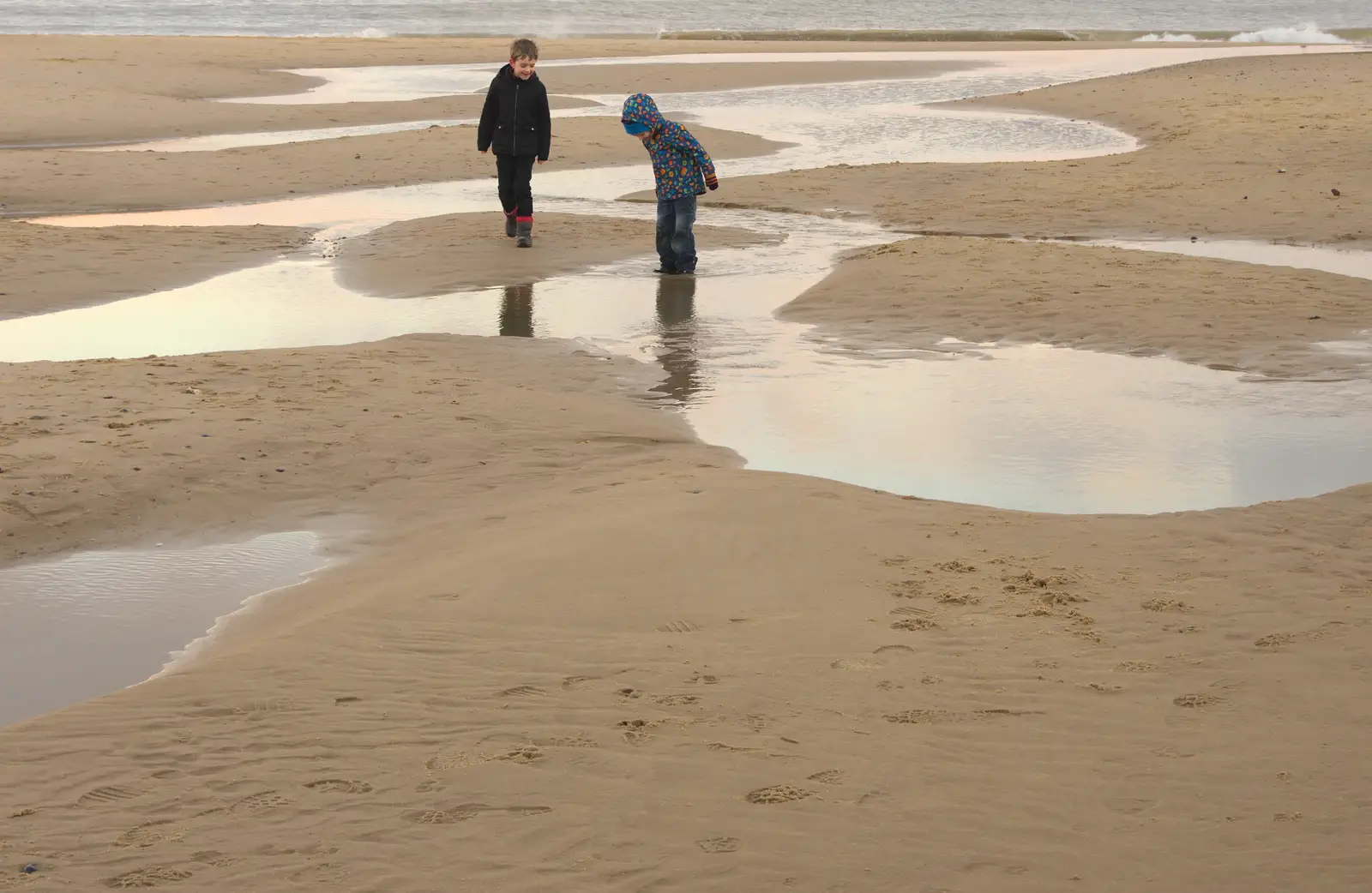 The boys mess around in a mini river on the beach, from Horsey Seals and Sea Palling, Norfolk Coast - 2nd January 2017