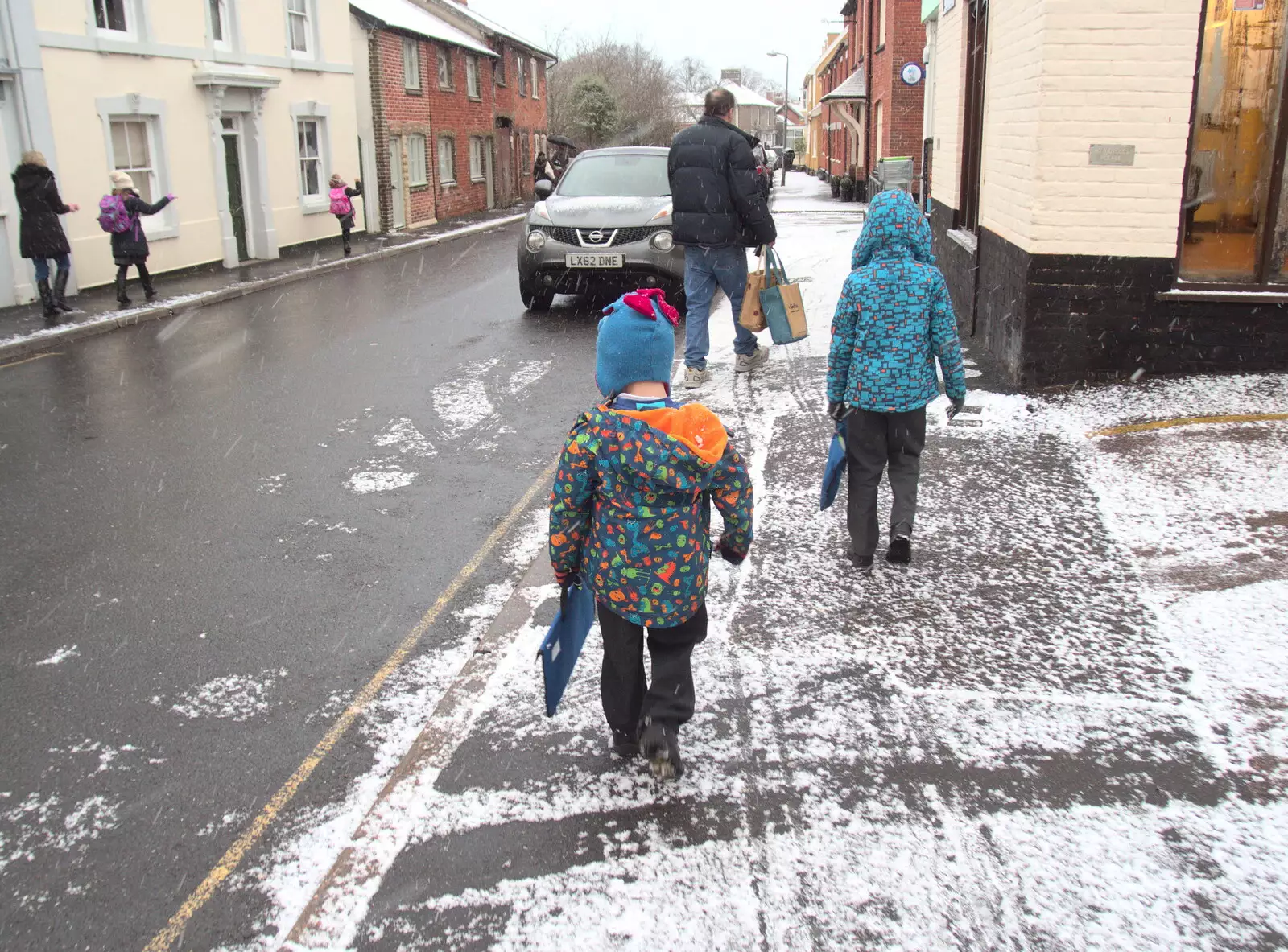 The boys stump up Church Street, from A Snowy January Miscellany, Eye, Suffolk - 15th January 2017