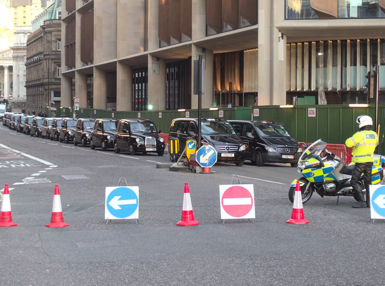 The rozzers keep an eye on a line of taxis, from SwiftKey's Last Days in Southwark and a Taxi Protest, London - 18th January 2017