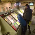 Fred reads something about Saxons in the cellar, A Day in Lavenham, Suffolk - 22nd January 2017