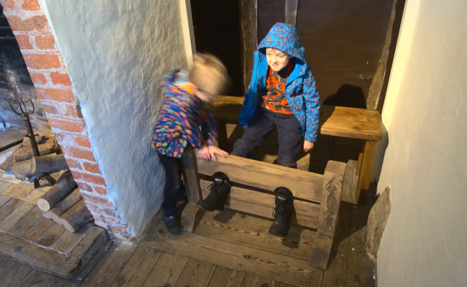 Fred tries out the stocks in the Bridewell, from A Day in Lavenham, Suffolk - 22nd January 2017