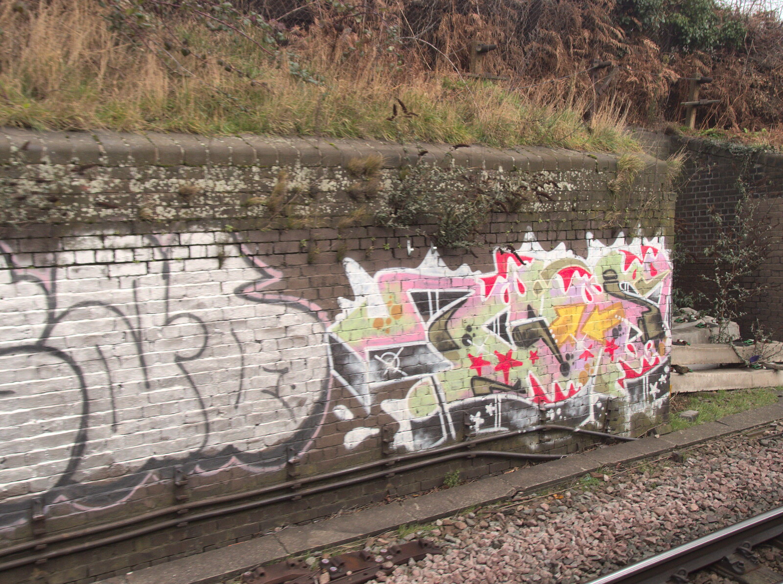 Graffiti on the railway from Grandad's Fire and SwiftKey Moves Offices, Eye and Paddington - 23rd January 2017