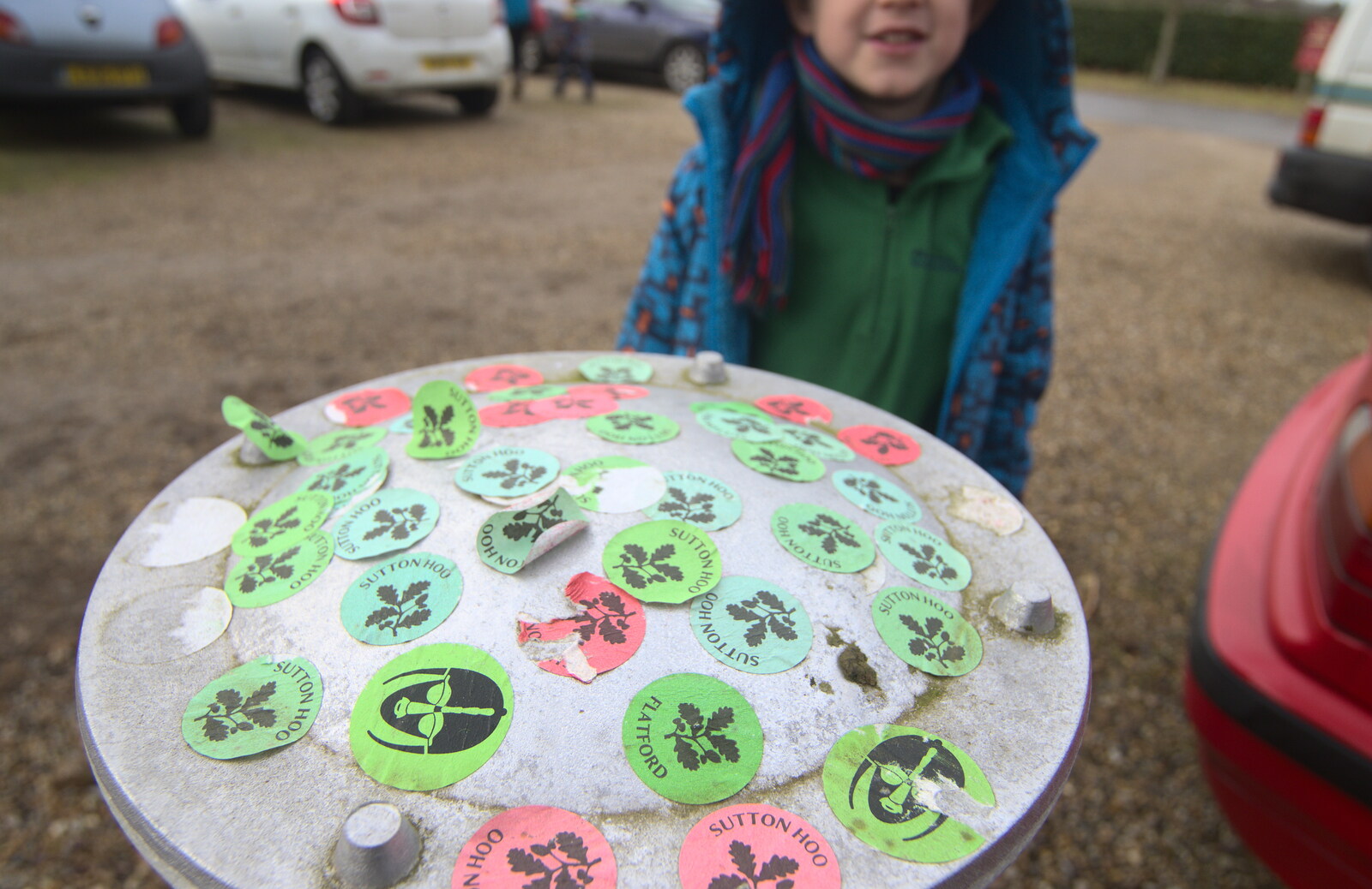 A bollard is covered in stickers from A Trip to Sutton Hoo, Woodbridge, Suffolk - 29th January 2017