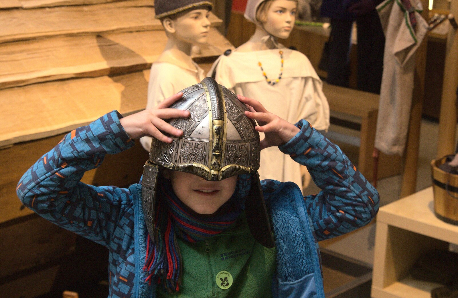 Fred tries on a helmet from A Trip to Sutton Hoo, Woodbridge, Suffolk - 29th January 2017