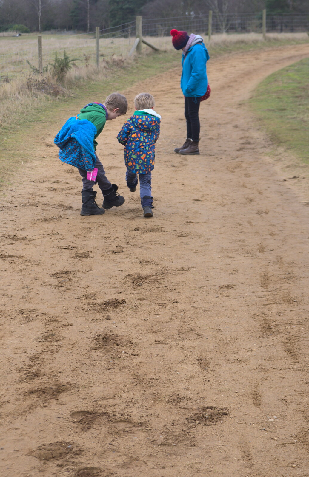 The boys enjoy making footprints in the sand from A Trip to Sutton Hoo, Woodbridge, Suffolk - 29th January 2017