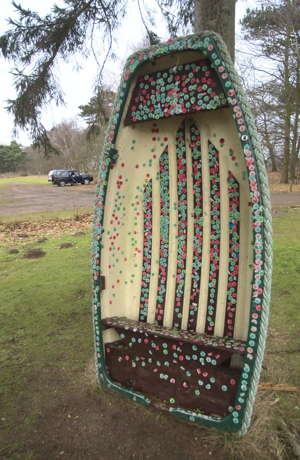 An upturned boat is covered in stickers, from A Trip to Sutton Hoo, Woodbridge, Suffolk - 29th January 2017