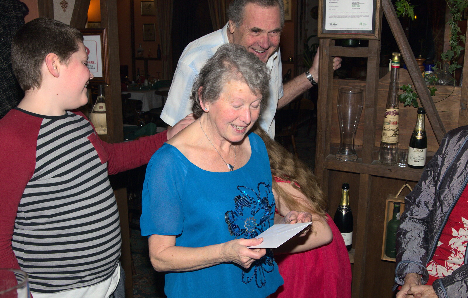 Sylvia gets a present from the bike club from Sylvia's 70th Birthday up the Swan Inn, Brome, Suffolk - 11th February 2017