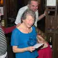 Sylvia gets a present from the bike club, Sylvia's 70th Birthday up the Swan Inn, Brome, Suffolk - 11th February 2017