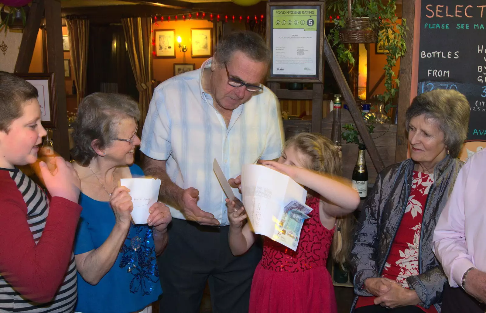 Alan has a look, from Sylvia's 70th Birthday up the Swan Inn, Brome, Suffolk - 11th February 2017