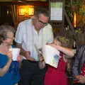 Alan has a look, Sylvia's 70th Birthday up the Swan Inn, Brome, Suffolk - 11th February 2017