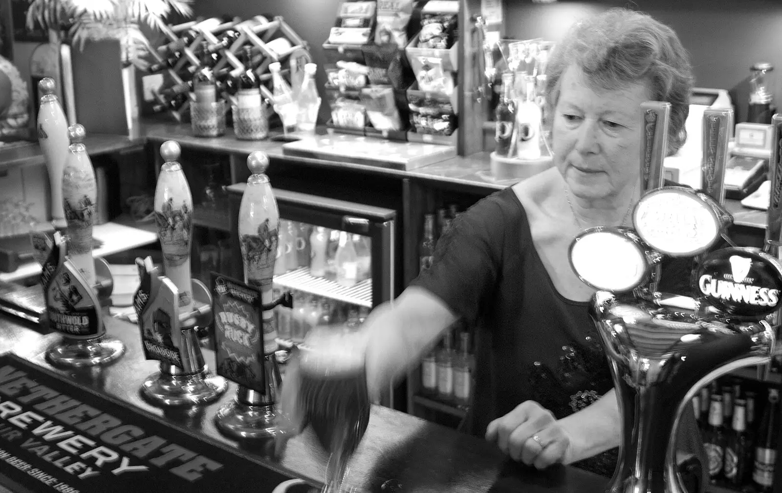 Sylvia serves a half, from Sylvia's 70th Birthday up the Swan Inn, Brome, Suffolk - 11th February 2017