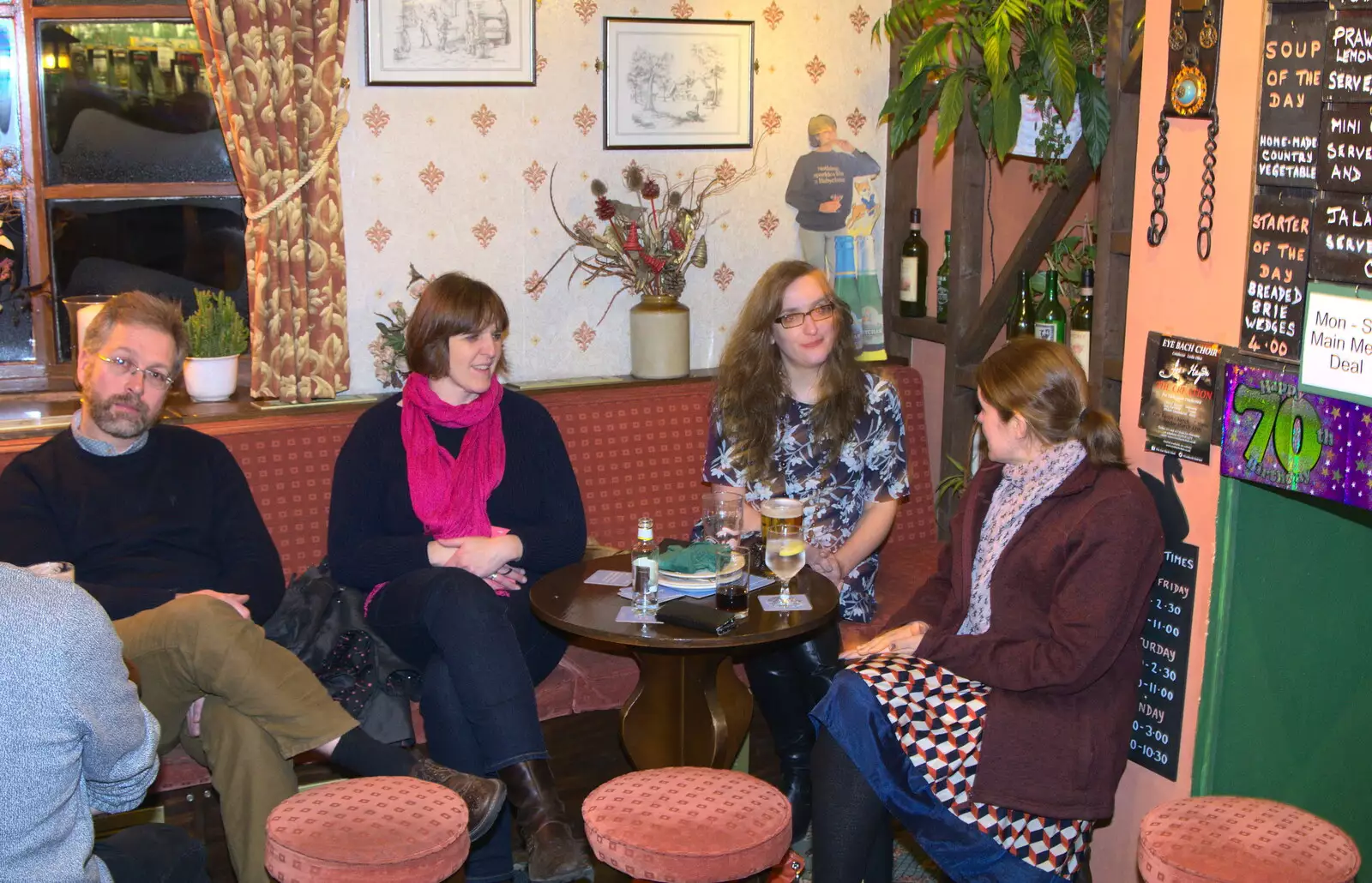 Marc looks glum as Suey and Sarah chat to Isobel, from Sylvia's 70th Birthday up the Swan Inn, Brome, Suffolk - 11th February 2017