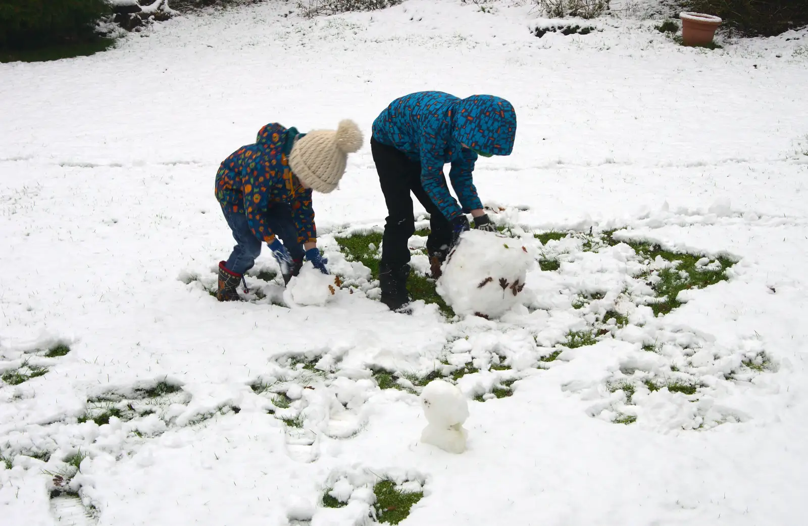 The boys start to pile up some snow, from A Snowy Day, Brome, Suffolk - 12th February 2017