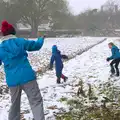 Isobel lobs a snowball, A Snowy Day, Brome, Suffolk - 12th February 2017