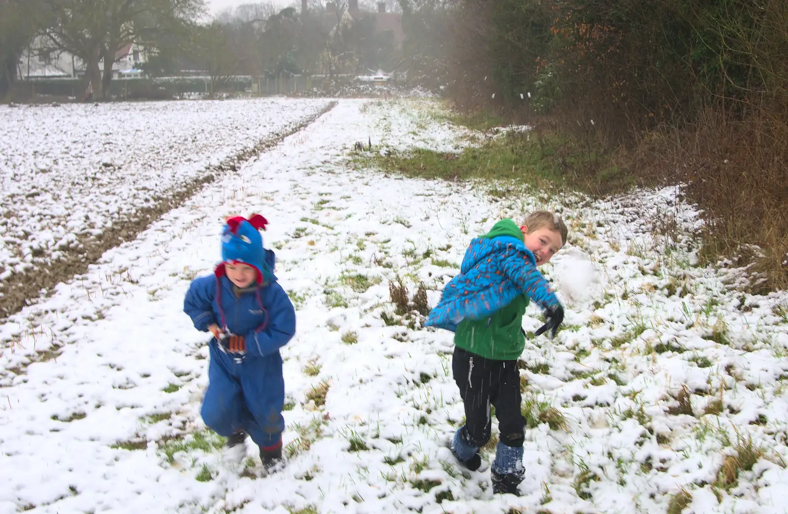 Fred lobs a snowball, from A Snowy Day, Brome, Suffolk - 12th February 2017