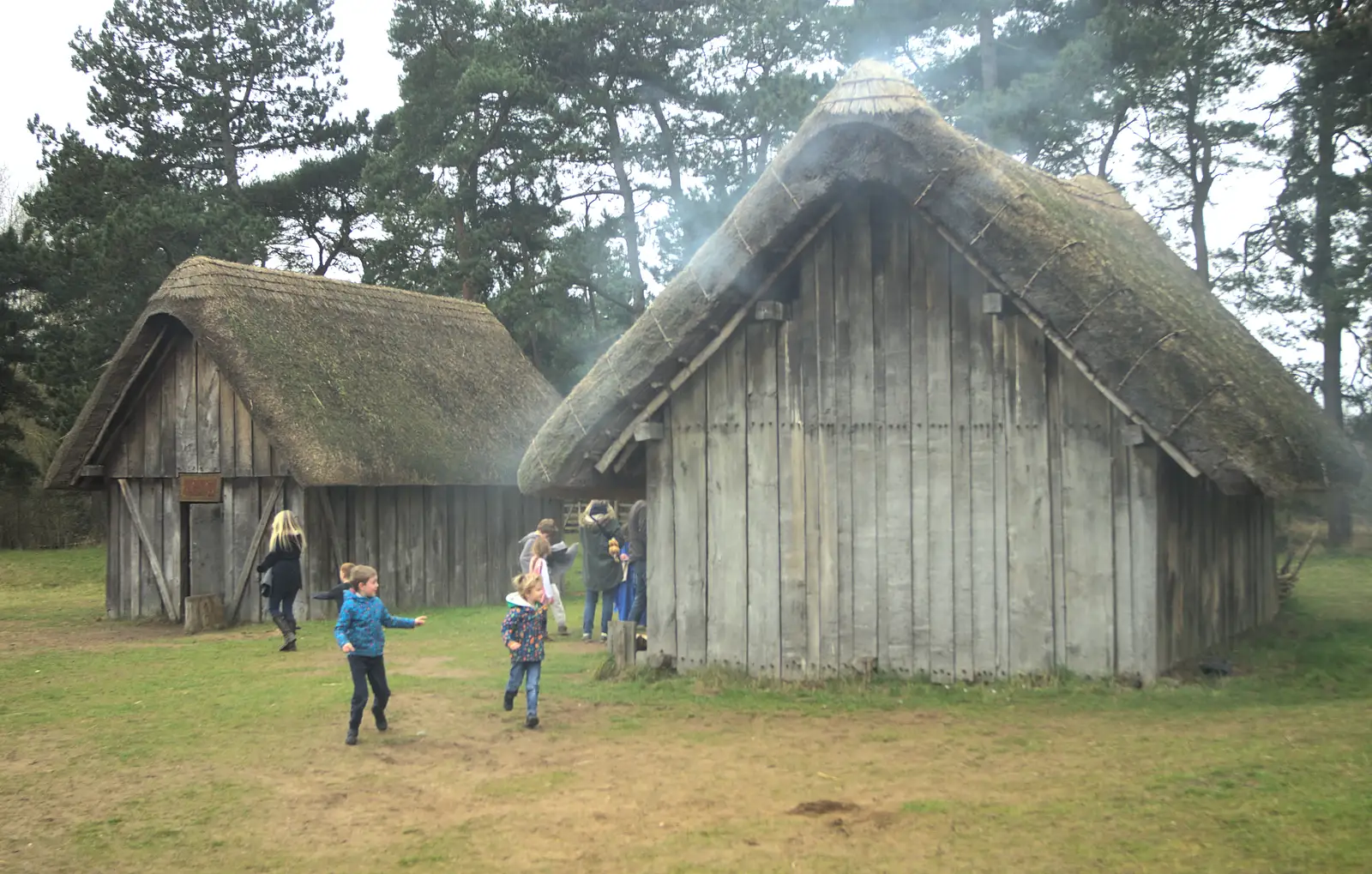 The boys run around a smoking house, from An Anglo-Saxon Village, West Stow, Suffolk - 19th February 2017