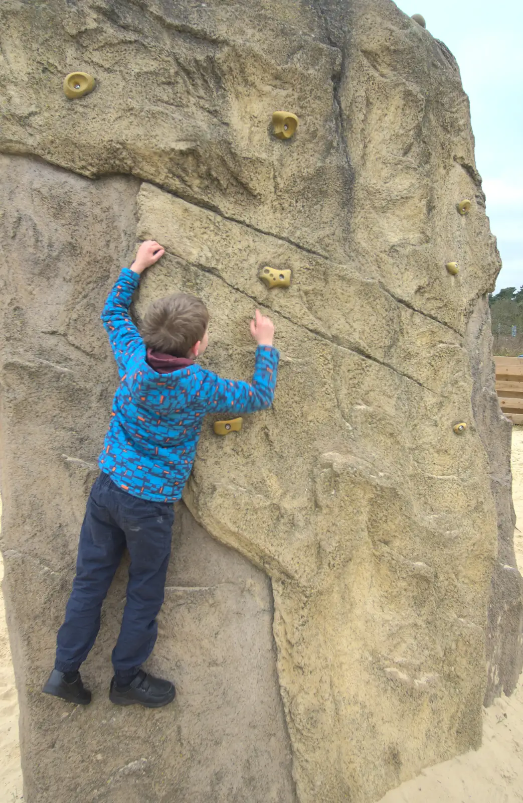 Fred clings to a climbing wall, from An Anglo-Saxon Village, West Stow, Suffolk - 19th February 2017