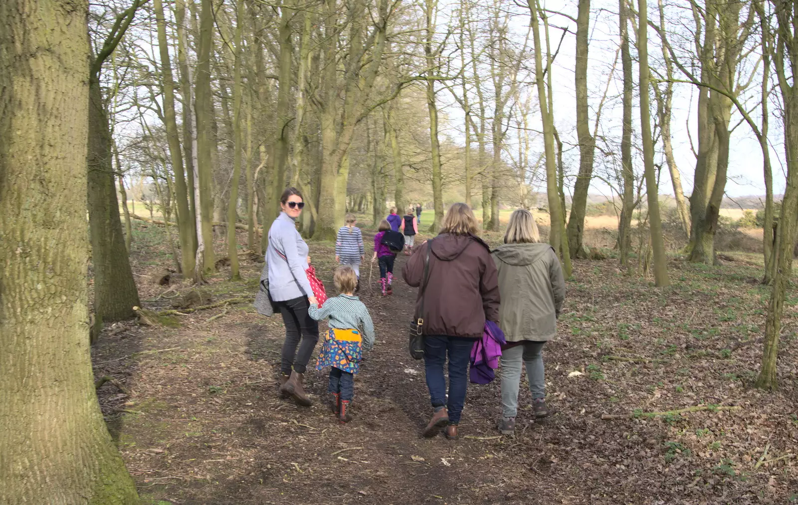 Through the woods, as Isobel looks back, from Redgrave and Lopham Fen, Suffolk Border - 11th March 2017