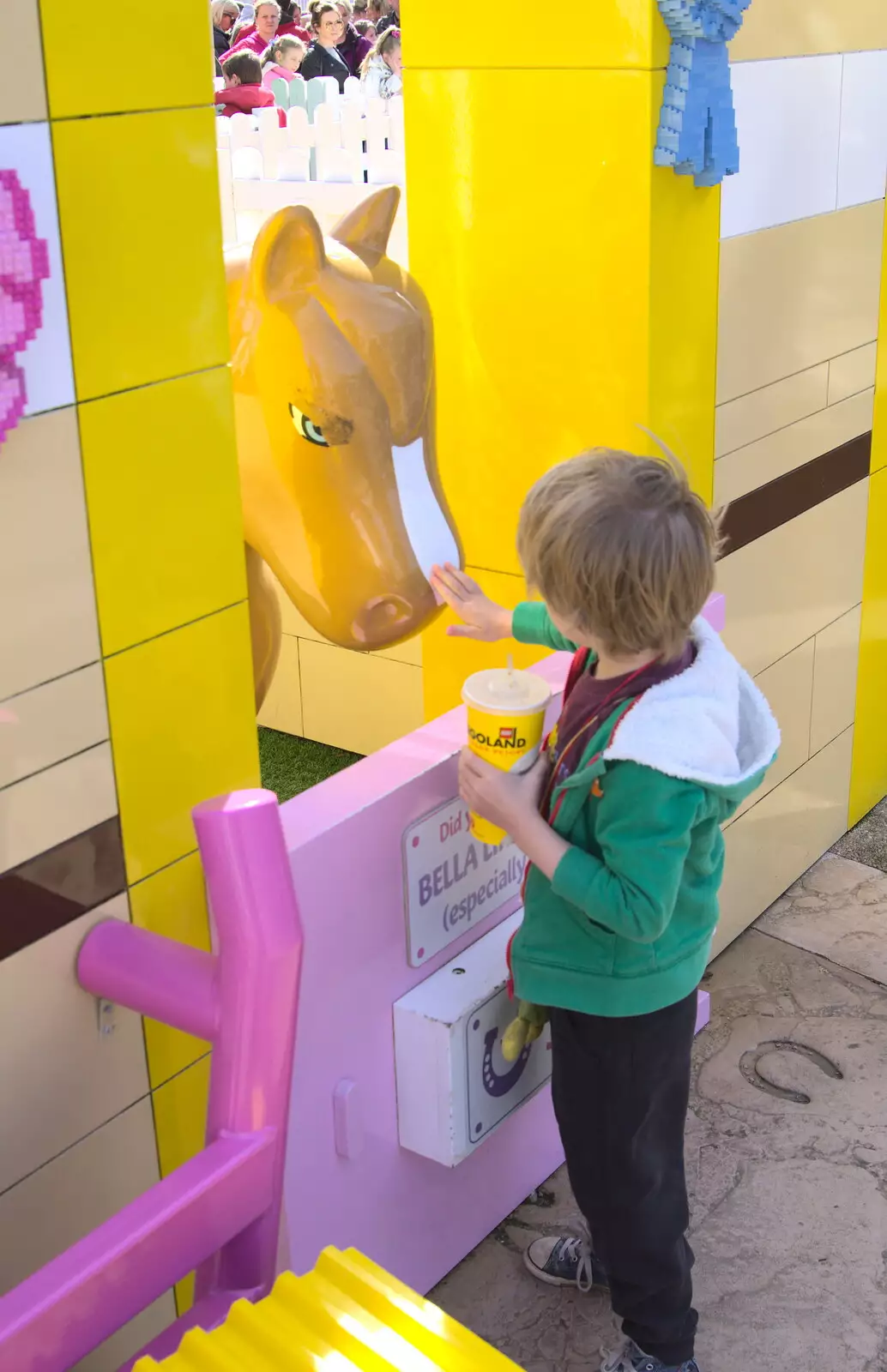 Harry pokes a massive Lego horse, from A Trip to Legoland, Windsor, Berkshire - 25th March 2017