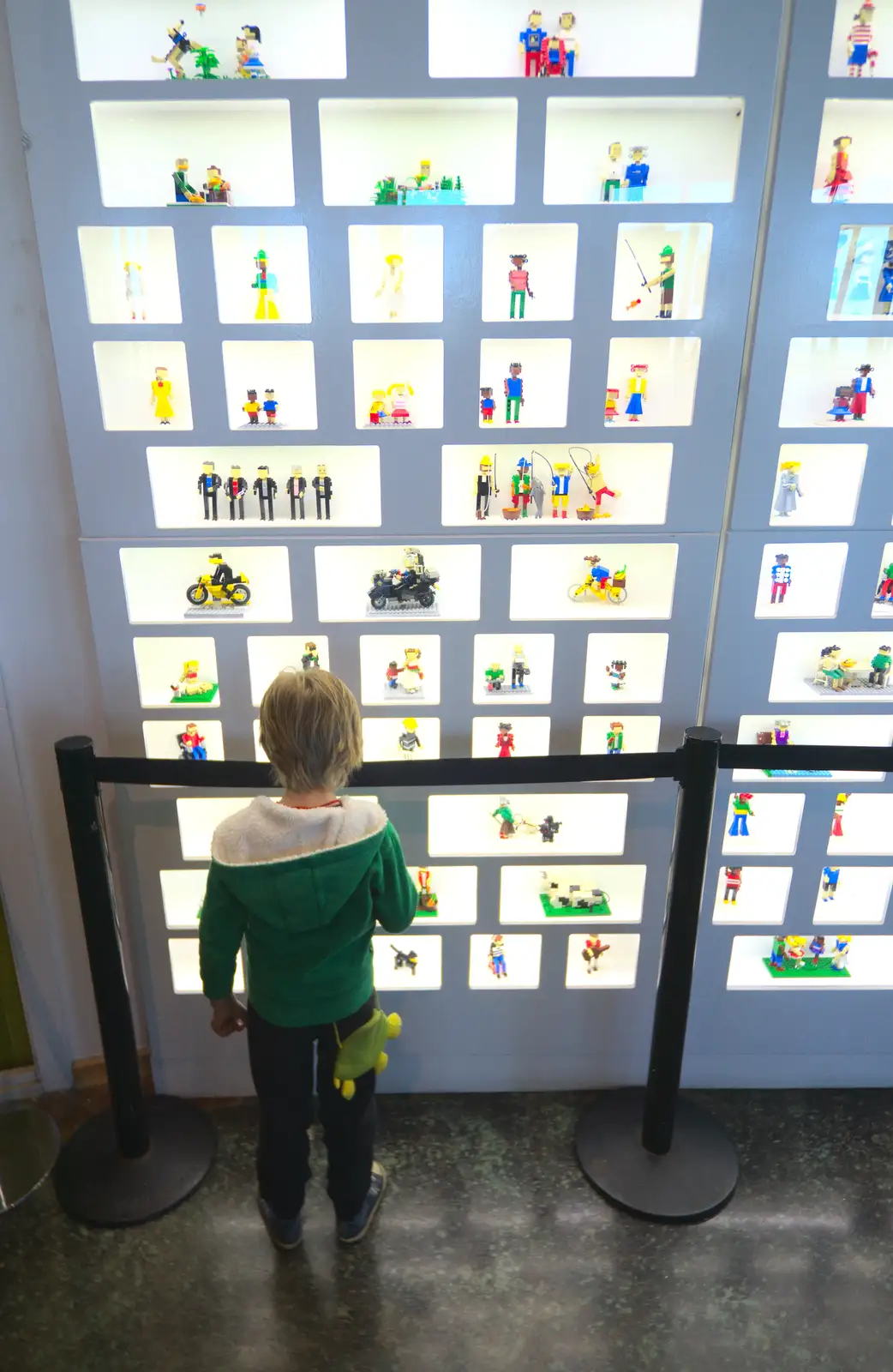 Harry looks at a wall of mini-figures, from A Trip to Legoland, Windsor, Berkshire - 25th March 2017