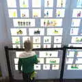 Harry looks at a wall of mini-figures, A Trip to Legoland, Windsor, Berkshire - 25th March 2017