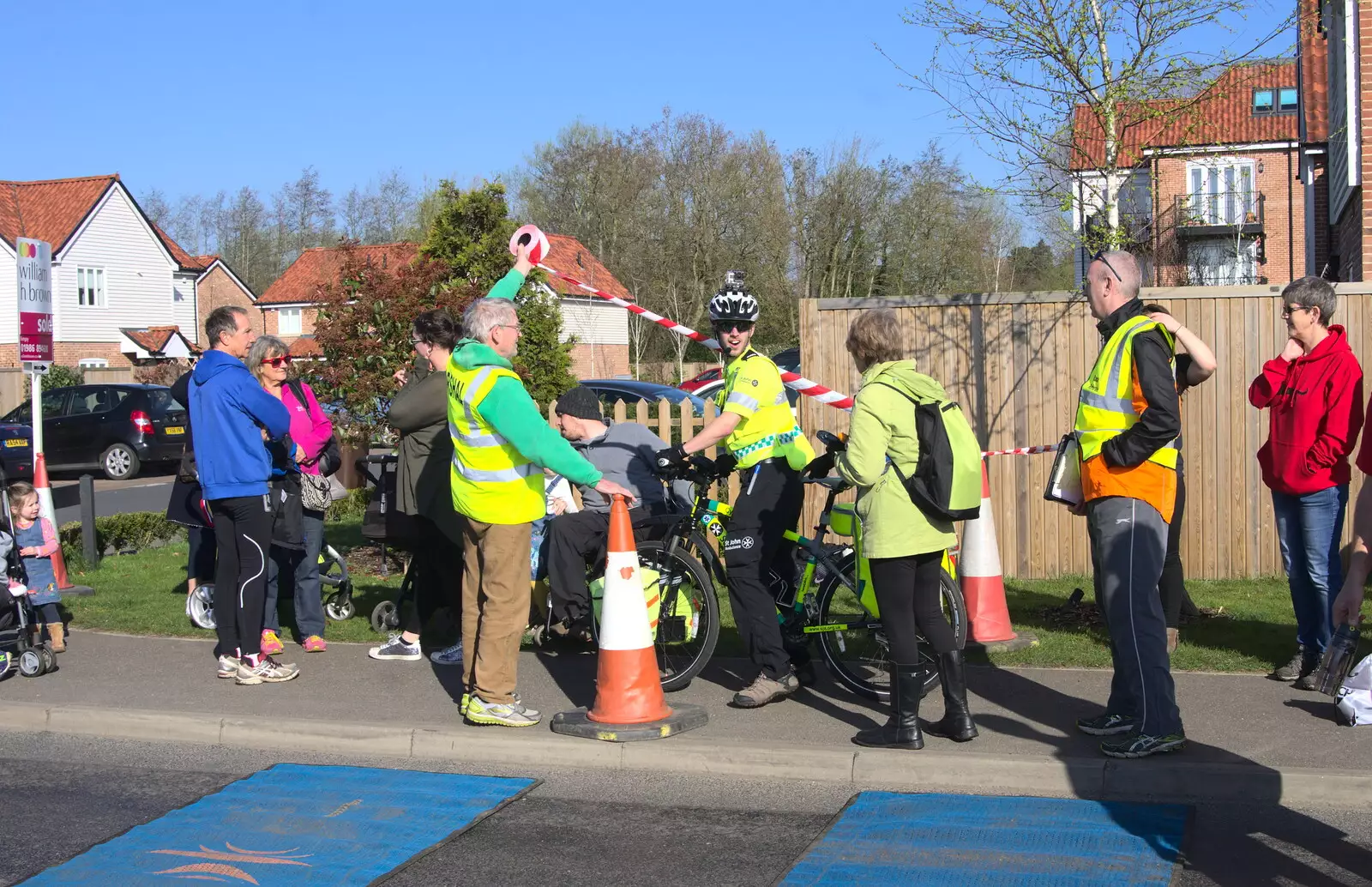 A St. John's dude on a bike checks in, from The Black Dog Festival of Running, Bungay, Suffolk - 2nd April 2017