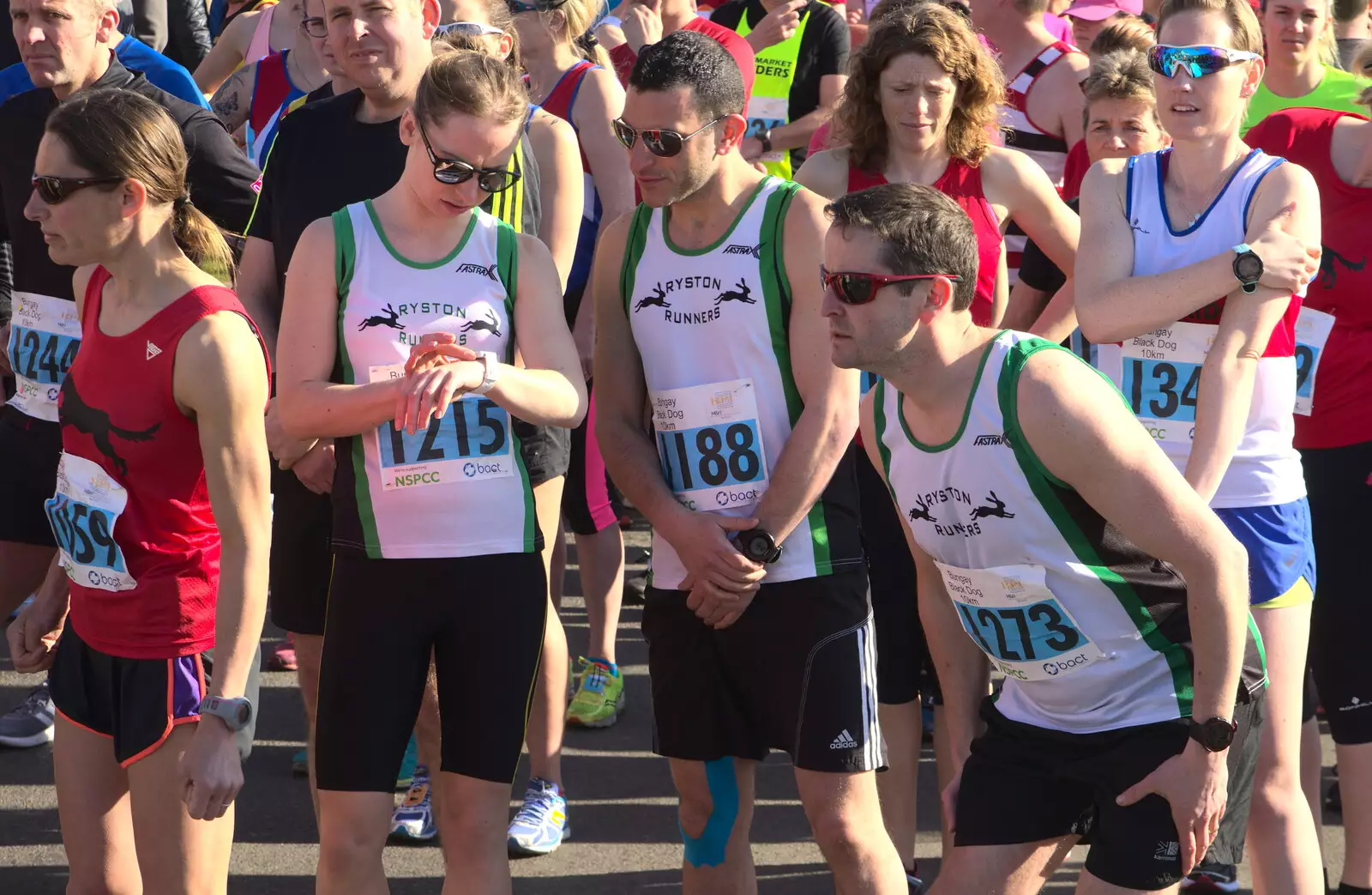 Watches are checked, from The Black Dog Festival of Running, Bungay, Suffolk - 2nd April 2017