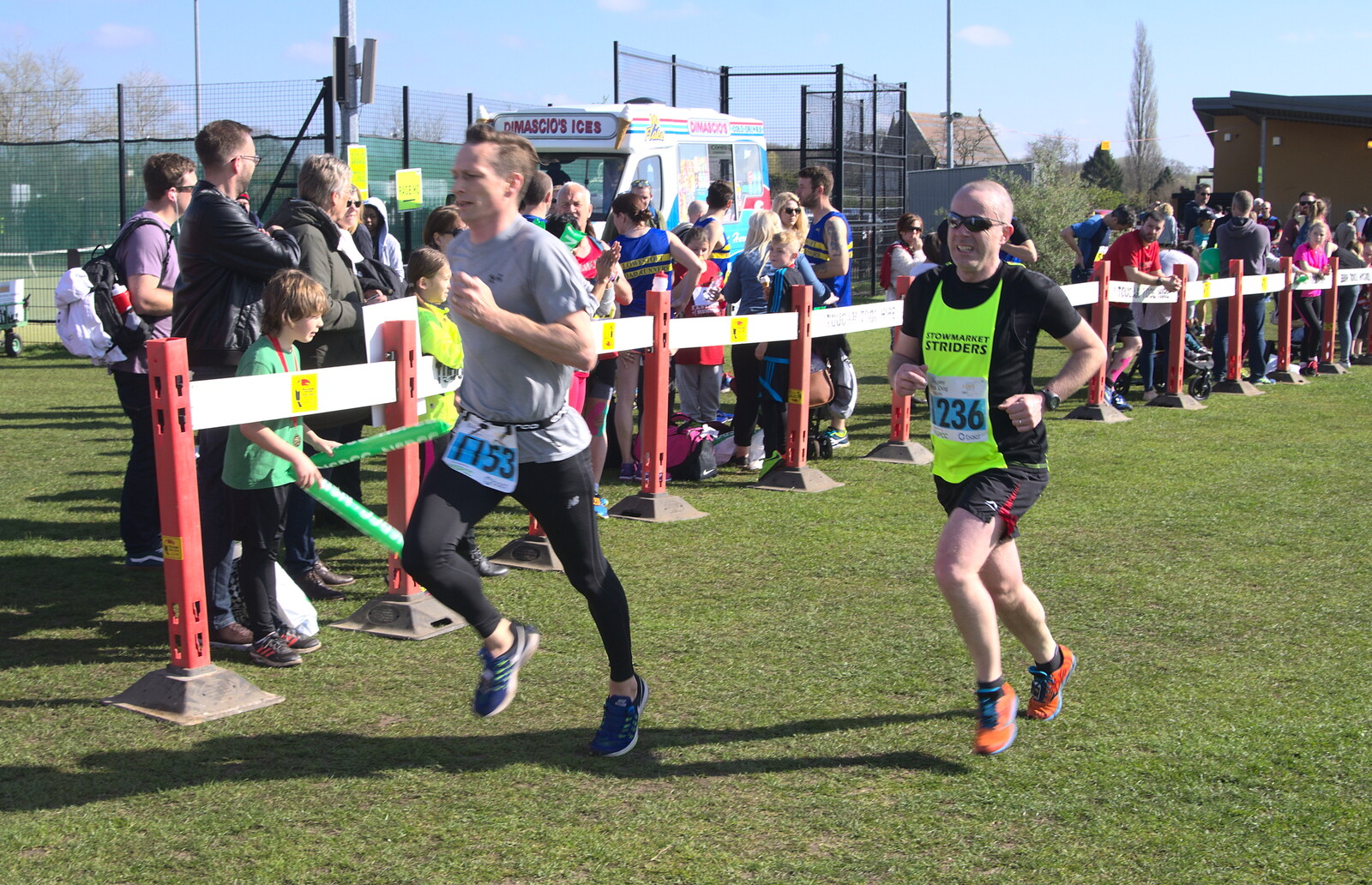 Some 10k runners cross the line from The Black Dog Festival of Running, Bungay, Suffolk - 2nd April 2017