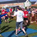 Isobel picks up a medal, The Black Dog Festival of Running, Bungay, Suffolk - 2nd April 2017